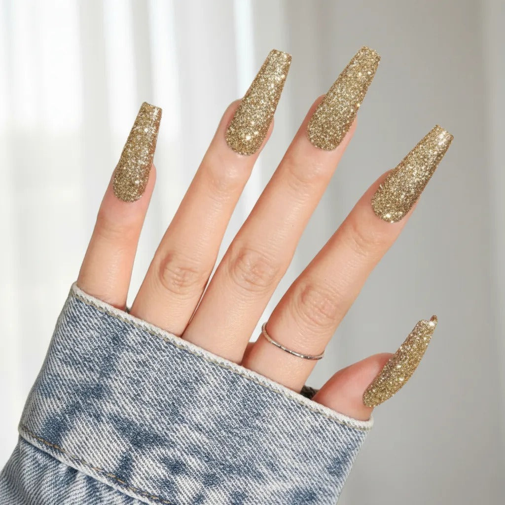 Uñas Press On estilo Ballerina Larga en color oro con purpurina